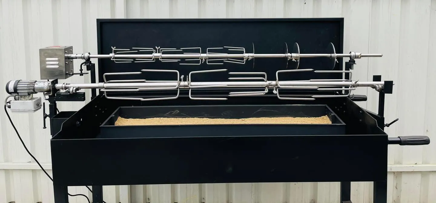 Hired spit roast rig set up and cooking a whole pig at an Adelaide backyard event