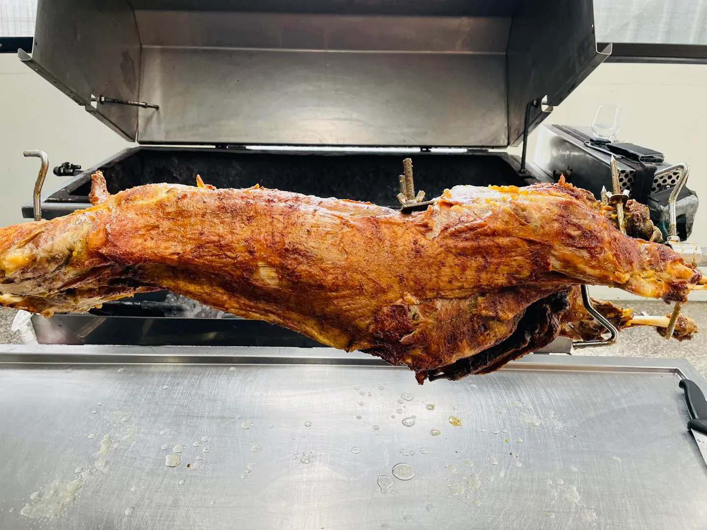 Whole goat spit roast at a Barossa Valley event